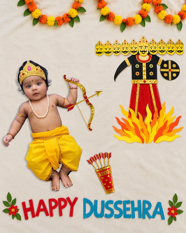 Baby with a golden bow and arrow beside a paper-craft ten-headed Ravan standing in flames, with marigold garlands and a Happy Dussehra felt-letter greeting
